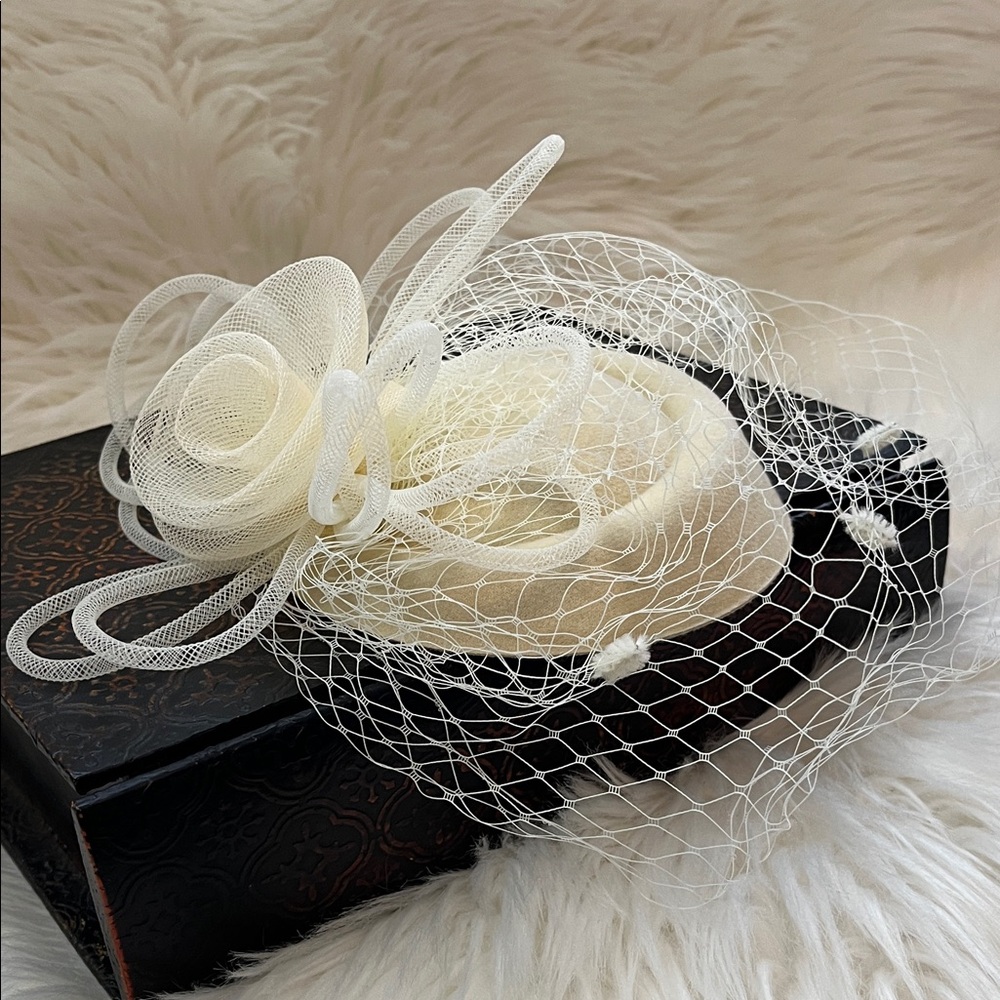 Elegant Cream Fascinator with Netting